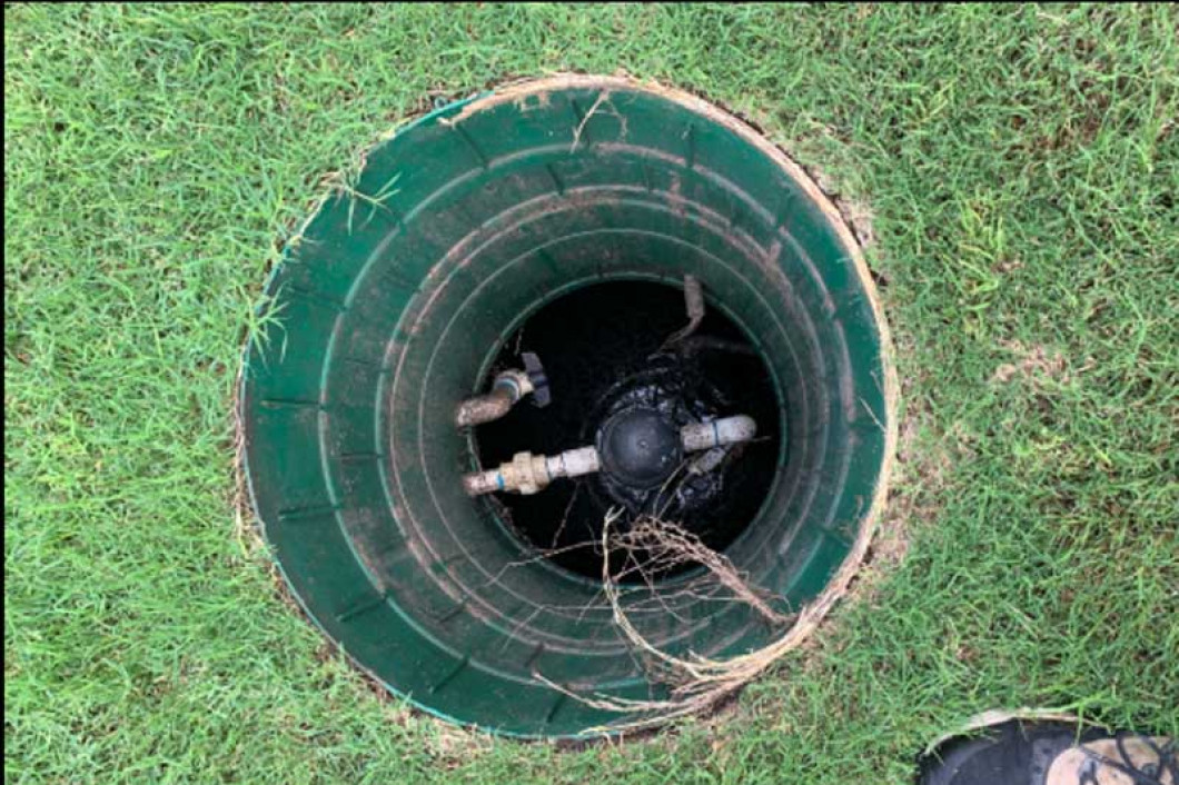 How to check septic tank sludge level